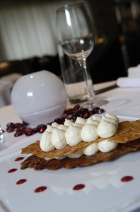 An almond nougatine with lemon curd mousse and a raspberry coulis is a specialty of the day at Maison Blanche.  (2.2.10; STAFF PHOTO / E. SKYLAR LITHERLAND)