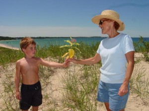 Sam gives a flower to his grand- mother, Jackie. He has lived with her in Bradenton for the past several years.(Provided by Tod Woolf)
