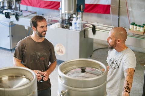 Matt Holt of Full Belly Stuffed Burgers, left, brews a beer with Big Top Brewing Co. brewmaster Josh Wilson at the Sarasota brewery on July 15. (Provided by Big Top Brewing Co.)