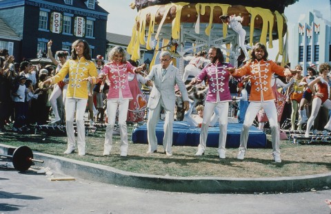 British pop group the Bee Gees take part in a scene during the filming of 'Sgt. Pepper's Lonely Hearts Club Band' in California, April 1978. From left to right; Robin Gibb; Peter Frampton, British singer; George Burns, American comic and actor; Maurice Gibb; Barry Gibb. (AP Photo)
