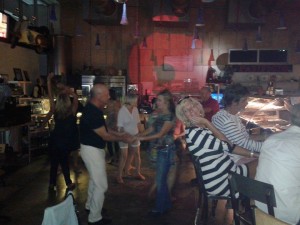 The dance crowd takes over the Gulf Gate pizza joint on Saturday nights.