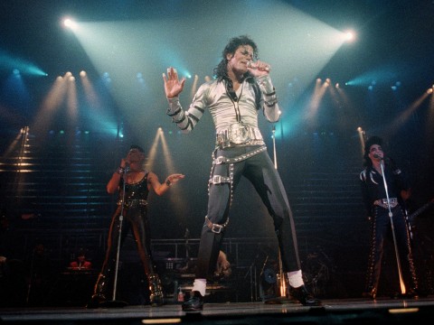 Pop singer Michael Jackson performs before a sold out crowd at the Los Angeles Sports Arens Sunday night, Nov. 13, 1988.. (AP Photo/Alan Greth)