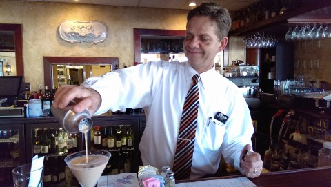 Bartender Terry Stark pours a Cafe con Leche Martini at Columbia Restaurant on St. Armands Circle. STAFF PHOTO / WADE TATANGELO