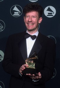 Lyle Lovett poses with his Best Country Album Award, for "The Road to Ensenada," during the 39th Annual Grammy Awards in New York Wednesday night, Feb. 26, 1997. (AP Photo/Kathy Willens)