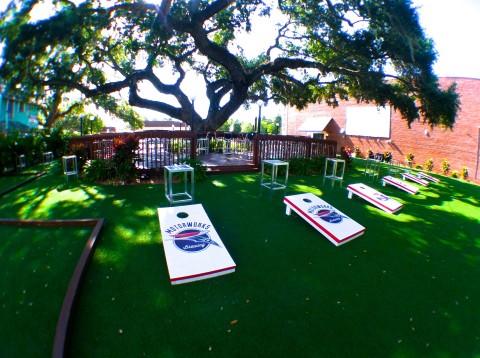 The cornhole area of the beer garden at Motorworks Brewing in Bradenton. COURTESY PHOTO