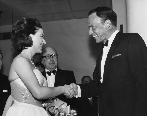 Britain’s Princess Margaret shakes hands with singed Frank Sinatra prior to his appearance at a midnight matinee in London’s Royal Festival Hall on June 1, 1962. The filmed concert is included on the new "Sinatra: London" box set.  (AP Photo/Pool)