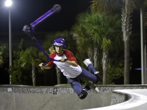 Tabitha Windle of Venice, who is into scooters is a frequent visitor to Bradenton's Riverwalk 24 -hour skateboarding Park. Windle, 18, loves to scooter late after midnight, here on  Jan. 4, 2015.  (Staff photo by Thomas Bender)