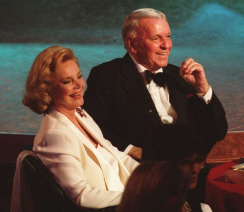 Frank Sinatra and his wife, Barbara, during the taping of an 80th birthday salute to Sinatra at the Shrine Auditorium in Los Angeles, Nov.19, 1995, which included a performance by Bob Dylan. (AP Photo/Mark J. Terrill)