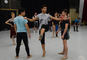 Graziano has dancers Kyle Hiyoshi (left) and Michael Burfield assist him with trying out a life for "En las Calles de Murcia."  / HT photo by Rachel S. O'Hara