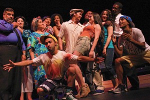 Justin Gregory Lopez, center, and the cast of the American Stage in the Park production of "In the Heights," the Tony Award-winning musical by Lin-Manuel Miranda. Chad Jacobs Photo/Provided by American Stage