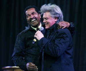 Marty Stuart, a 5-time Grammy winner and Grand Ole Opry star, right, jokes with 2013 Governor's Arts Award Lifetime Achievement awardee bluesman Bobby Rush during ceremonies in Jackson, Miss., Thursday, Feb. 21, 2013. Established in 1988, the Governor's Arts Awards recognize those who have made noteworthy contributions to and achieved artistic excellence in the state or have significant ties to Mississippi. (AP Photo/Rogelio V. Solis)
