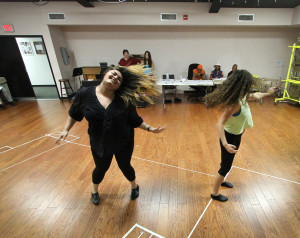 Jamie Millan, left, and Melissa Heaton, throw around their hair during a dance routine that was part of the audition for the Venice Theatre production of "Hair," directed by Ben Vereen. Matt Houston photo