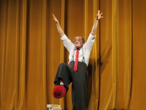 Clown Kirk Marsh gets some laughs performing hat-catching tricks during the Summer Circus Spectacular at the Historic Asolo Theater. STAFF PHOTO/JAY HANDELMAN