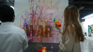 Miroslaw Chudy's recent installation at a Miami gallery encouraged visitors to spray a canvas with Super Soaker water guns filled with paint. / Courtesy photo