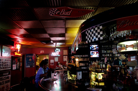 06.02.2004 ** [photograph by LAURA EL-TANTAWY, SARASOTA HERALD-TRIBUNE]  ** Inside Sarasota's Broadway Bar, 1044 N. Tamiami Trl., infamous for some of the best pizza in town, customers are a little upset the hangout joint will be closing to be reborn next spring with a new look, Friday, July 2, 2004. It will be closing this weekend.