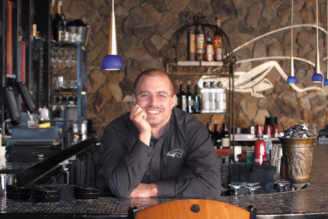 PHOTO BY MARY McCULLEY for STYLE. Illustrates story for April '03 issue on local bartenders.  Mike Yoder, bartender at Main Street Bistro and The Silver Cricket