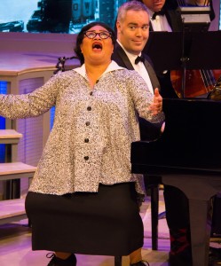 Lulu Picart as Agnes Gooch, sings as musical director Michael Raabe plays in the freeFall Theatre production of "Mame." MIKE WOOD LIGHTING PHOTO/PROVIDED BY FREEFALL