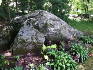 The famous rock that gives "The Pillow" its name. The smaller rock to the left is a memorium to Barton Mumaw, one of Ted Shawn's original "Men Dancers." / Herald Tribune photo by Carrie Seidman