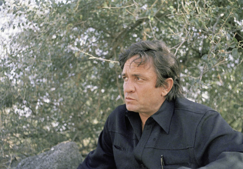 American country singer Johnny Cash shown on location during the filming at the Sea of Galilee, Dec. 12, 1971. He is making a 90 minutes feature film on the life of Jesus Christ, in which Cash invested half a million of his own money. He narrates and sings on the soundtrack but does not appear in the film. (AP Photo)