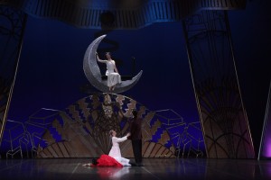 A floating crescent moon is but one of the "special effects" in the Sarasota Ballet's "John Ringling Circus Nutcracker." (Pictures, Victoria Hulland as Mable Ringling and Jessica Cohen as Clara.)/ Photo by Frank Atura