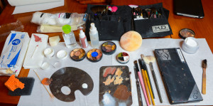 Some of the paints, powders and lotions used by Parker Lawhorne in his makeup designs. STAFF PHOTO / DAN WAGNER