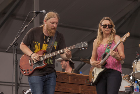 Derek Trucks and Susan Tedeschi perform with Tedeschi Trucks Band at the New Orleans Jazz & Heritage Festival, on Friday, April 24, 2015 in New Orleans. (Photo by Barry Brecheisen/Invision/AP)