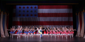 Ricardo Rhodes and Victoria Hulland leading the troops in Geroge Balanchine's "Stars and Stripes." / Photo by Frank Atura