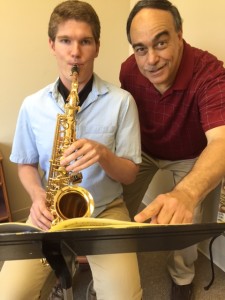 William Barbanera, (right), conductor of the Sarasota Concert Band, works with saxophone soloist Jeffrey Thompson for the debut of the Honors Band concert. PHOTO PROVIDED BY SARASOTA CONCERT BAND