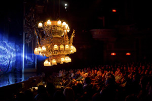 The famed chandelier in the musical "The Phantom of the Opera" moves over the audience during a performance in 2012. (Sara Krulwich/The New York Times)