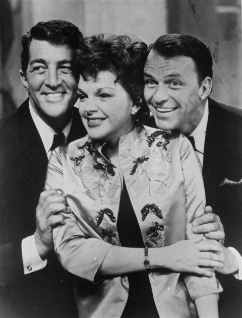 Judy Garland poses between Frank Sinatra, right, and Dean Martin at the Sands Hotel in Las Vegas, Nevada, in a 1962 photo.  (AP Photo/The Sands Hotel)