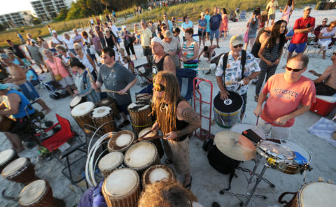 Sunday night on Siesta Key Beach drummers, dancers and spectators form a circle on the beach and enjoy the rhythmic sounds of drums until well after sunset. The Siesta Key Drum Circle is celebrating it's 20th year. May 15, 2016; Herald Tribune/Carla Varisco