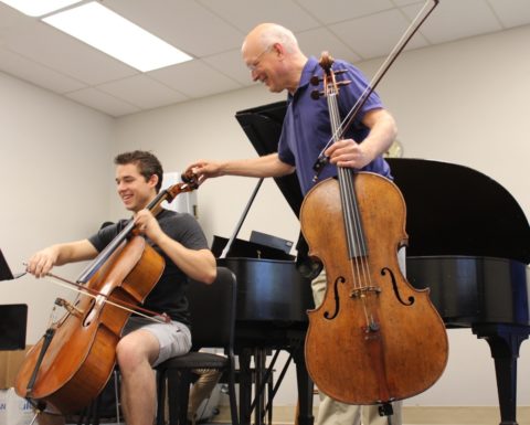 21-year-old cello student Daniel Tavani attends a master class with Sarasota Music Festival faculty member Timothy Eddy. Tavani worked on his musicality and atmosphere during the session. DAHLIA GHABOUR PHOTO