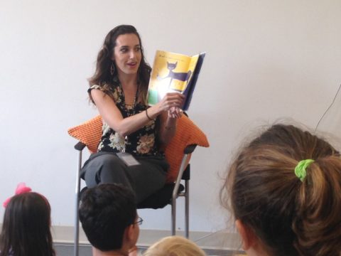 "Pete the Cat: I Love my White Shoes" is read aloud at ROAR! where storytelling and art-making engages kids over the summer. PHOTO BY KIM DOLEATTO 