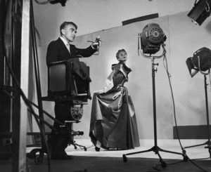 Horst P. Horst directing lighting and cameras during a fashion shoot with model Lisa Fonssagrives. / Roy Stevens/Time & Life Pictures/Getty Images
