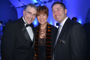 Sarasota Orchestra president and CEO Joe McKenna, left, board chair Anne Folsom Smith,and concertmaster Daniel Jordan at the orchestra's Mozart Gala Dinner in January 2015. Photo by Wendy Dewhurst Clark