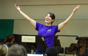 Celia Sperotto leads the kids orchestra on Friday. STAFF PHOTO / DAN WAGNER